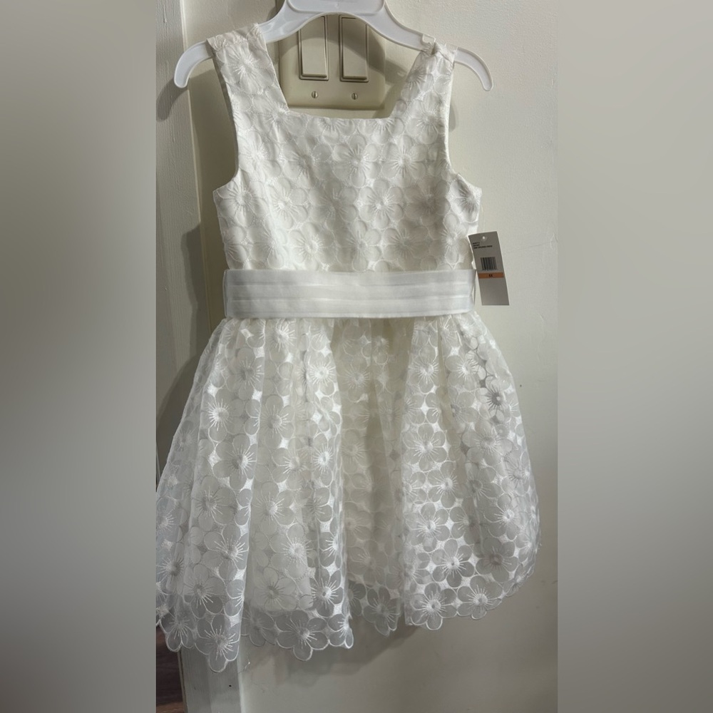 Jessica Simpson - sleeveless fit + flare white embroidered organza dress.